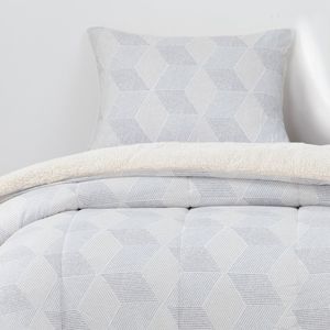 Plumon  Plazas Reversible Sherpa Block Gris  Dib